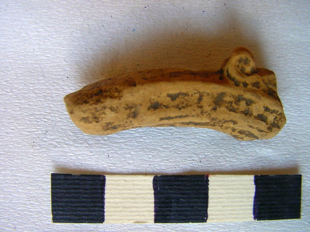 Pottery lamp fragment
