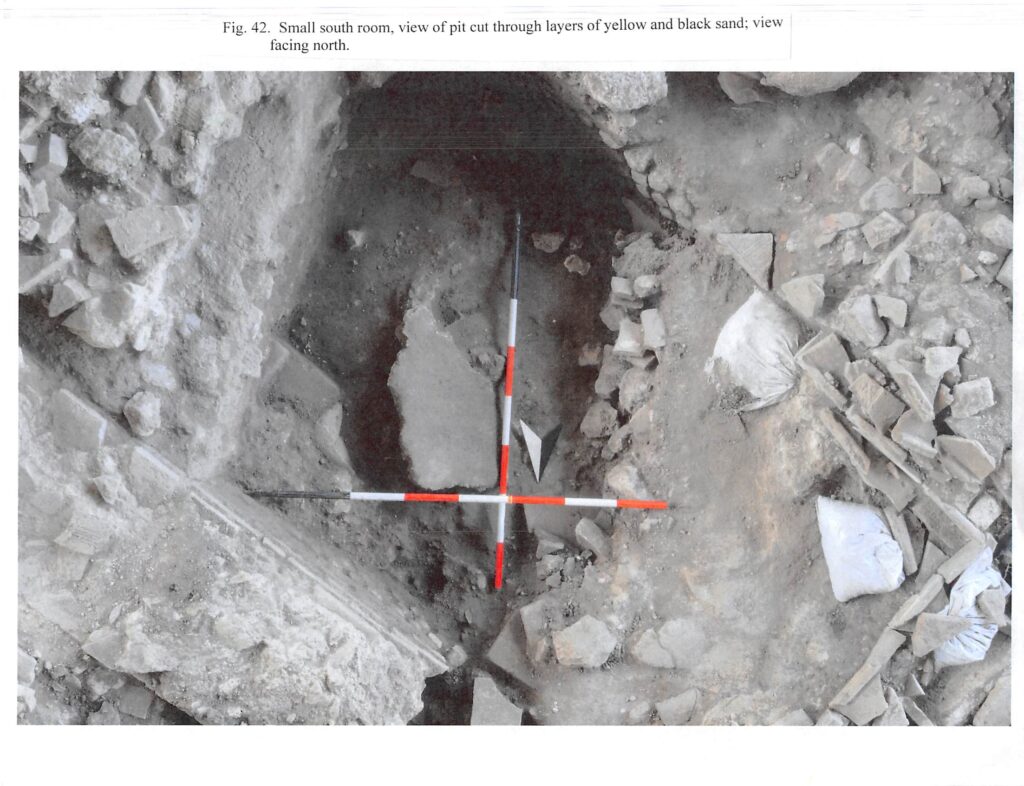 2013 - Fig 42 - Small South Room, View of Pit Cut through Layers of Sand